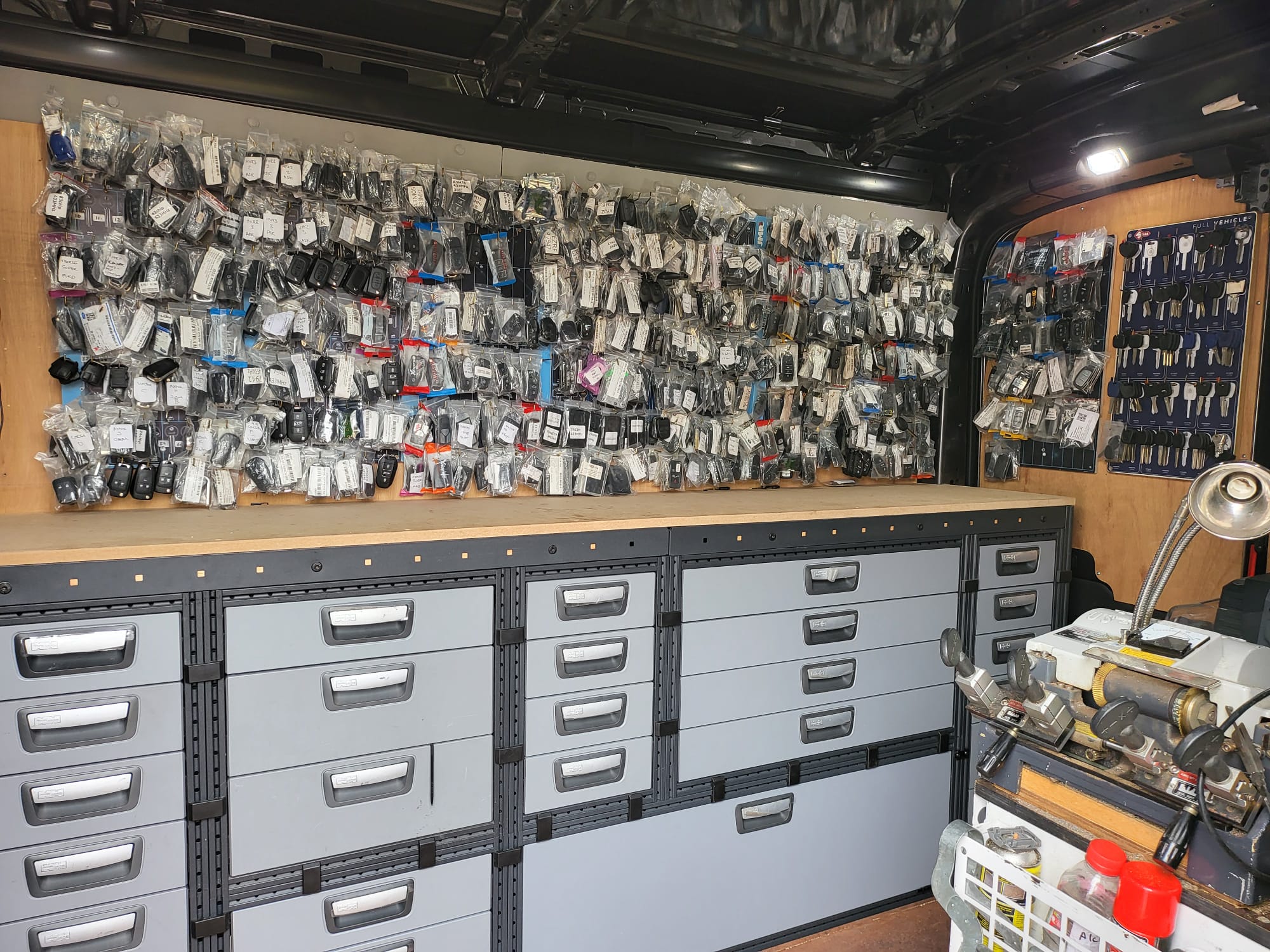 Inside the S&L mobile van, hundreds of car key blanks and fobs in stock